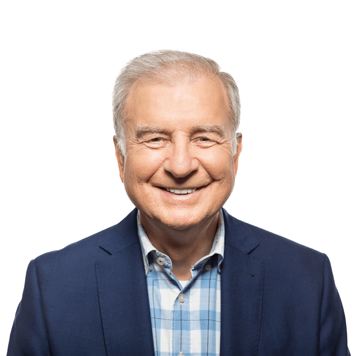 headshot of an older gentleman smiling